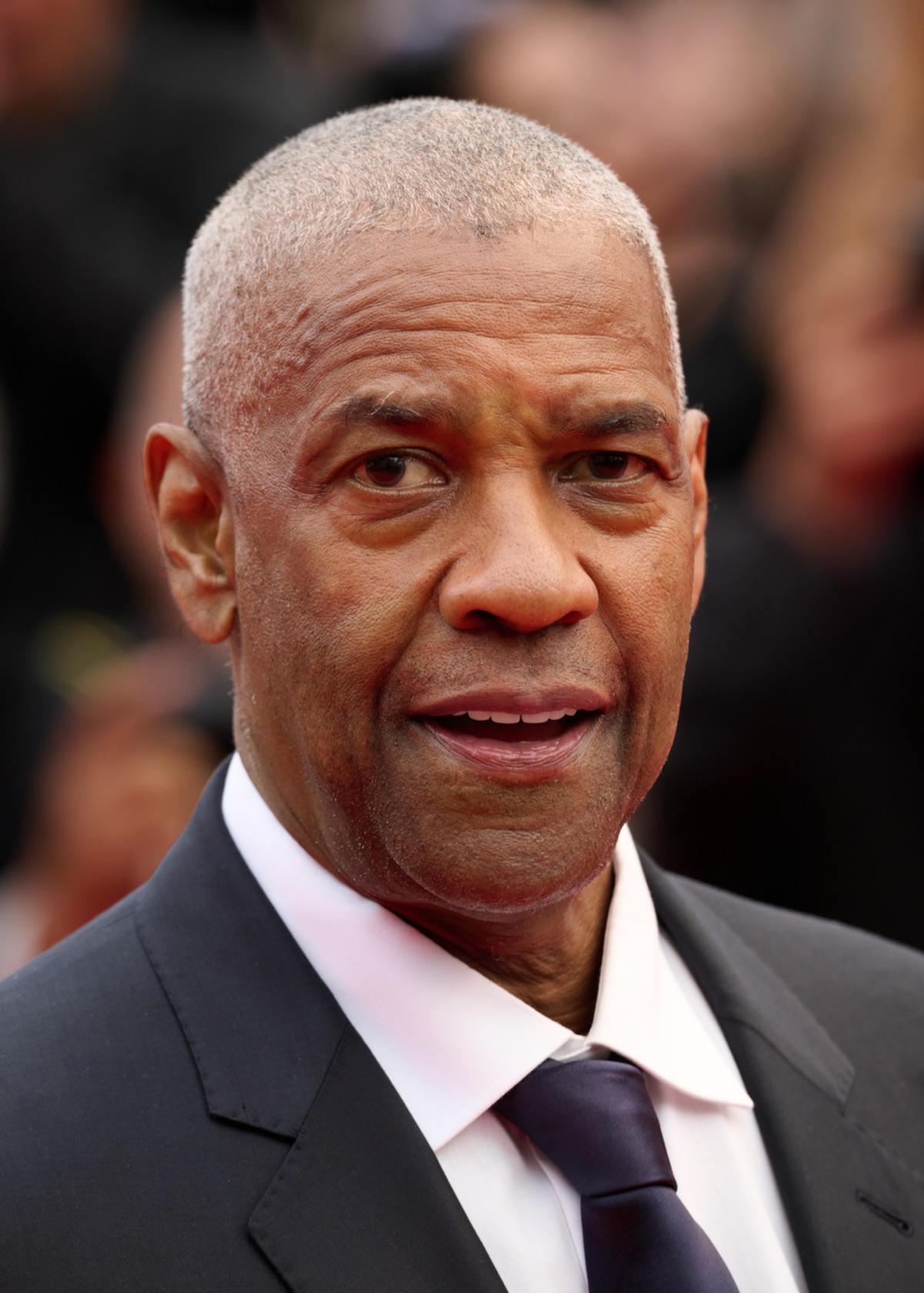 Denzel Washington at the 2025 Cannes Film Festival. He received his minister's license at Kelly Temple Church of God in Christ in Harlem in December 2024.
